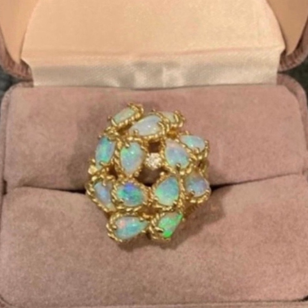 Beautiful vintage Gold Opal and Diamond Ring features ornate gold leaf sides
